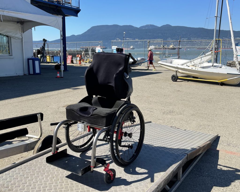 Joshua's empty wheelchair left on the shore.