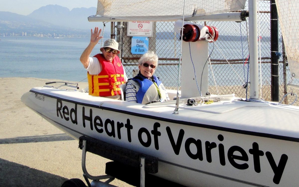Jack and Jean sitting in a martin 16 boat ready to get out on the water at the Jericho sailing centre.