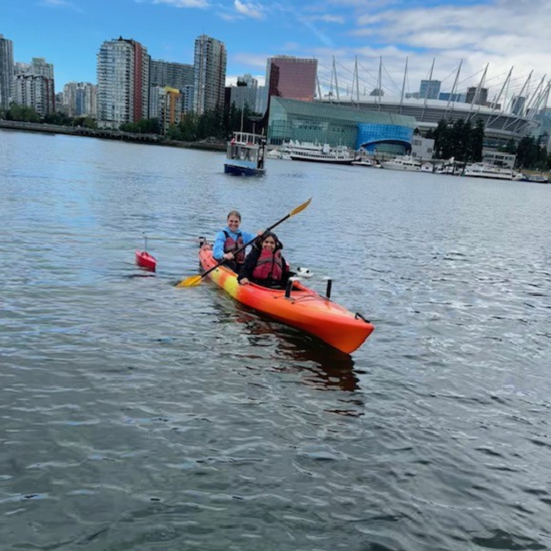 Jaden kayaking with a client