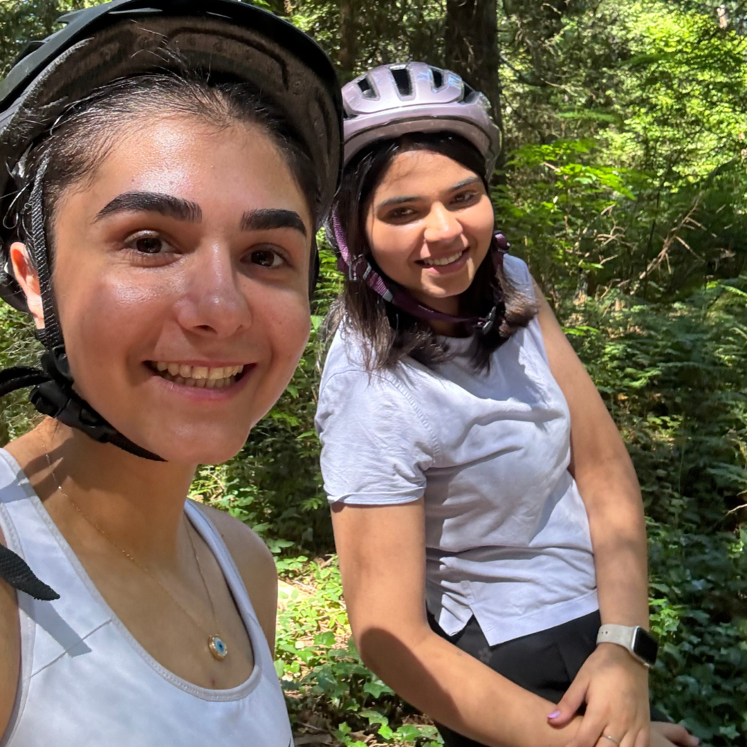 Anahita and fellow volunteer Mehak during one of their adapted cycling shifts